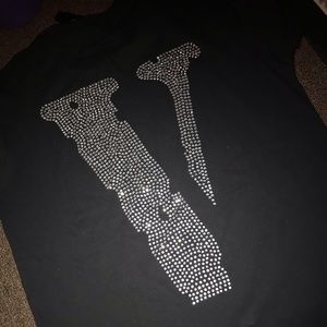 Vlone shirt.
